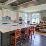 The kitchen and dining area of the Oakton luxury home from CarrHomes in Hamilton.