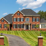 The brick exterior of a luxury home designed and built by CarrHomes in Hamilton.