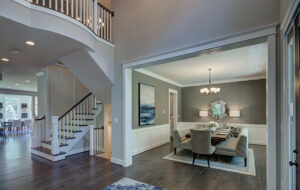 A side view of the dining room and staircase of a luxury home from CarrHomes in Hamilton.