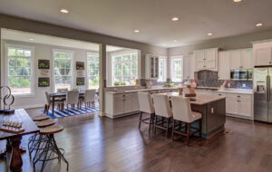 Another angle of the interior home design of a CarrHomes kitchen and dining area in Hamilton.
