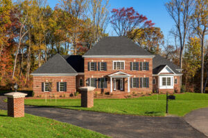A red brick designer home created by CarrHomes in Hamilton.